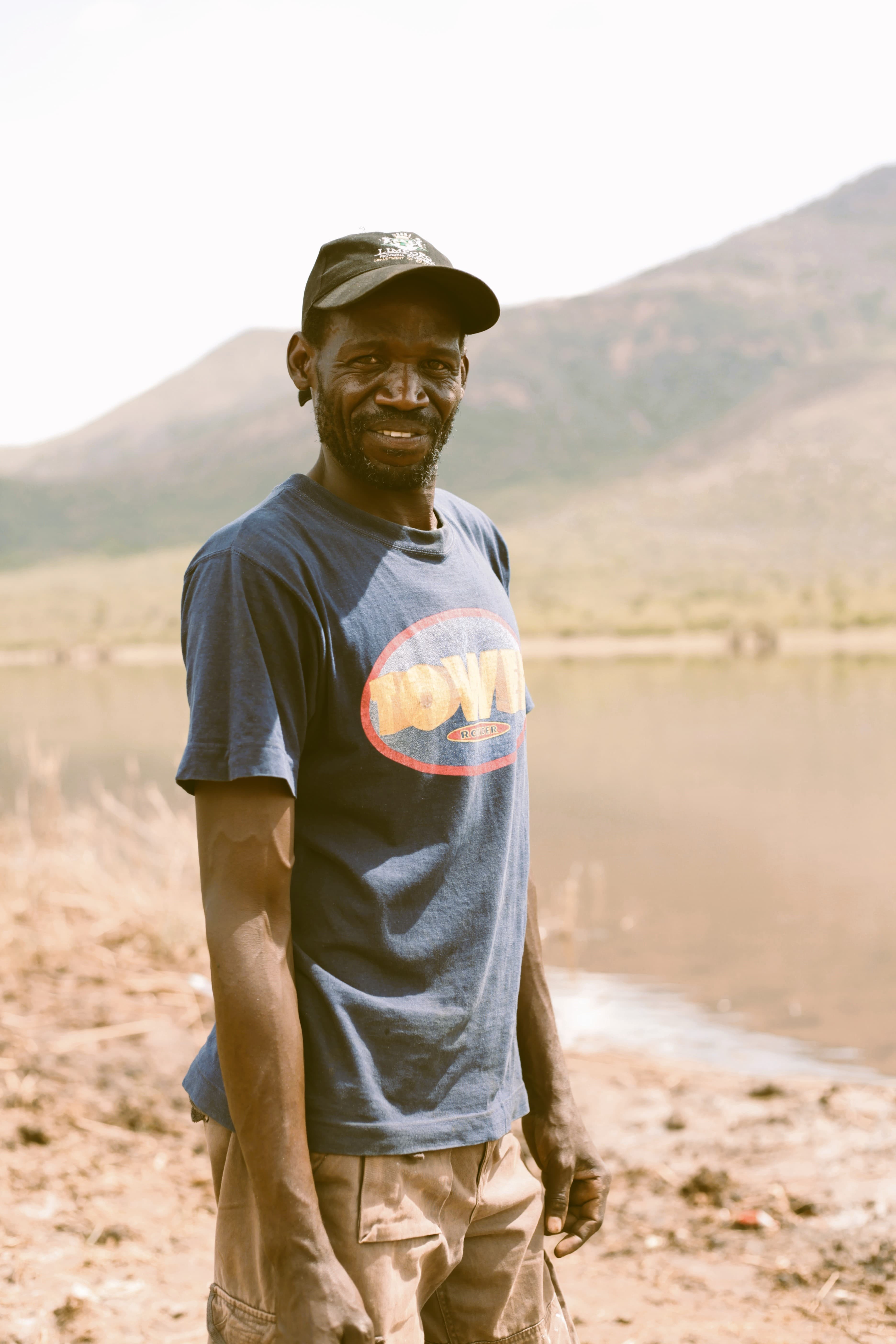 A fisherman smiling at the camera